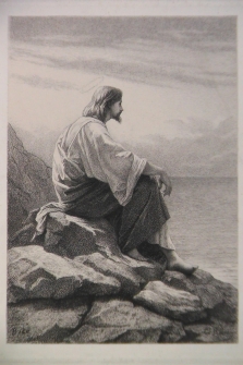 Jesús sentado en la orilla del mar